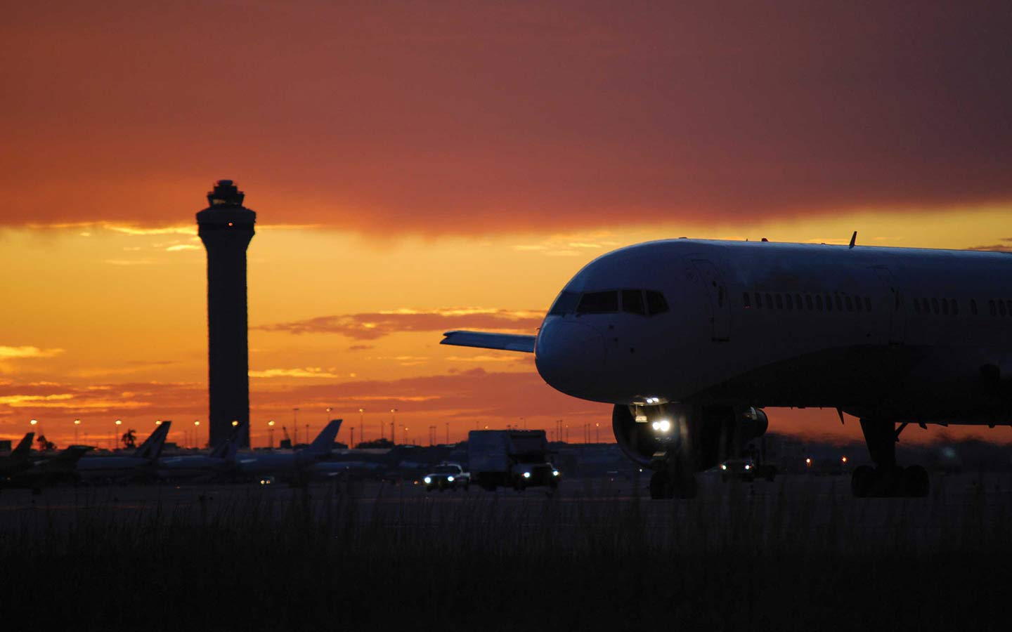 Airport and control tower at dusk