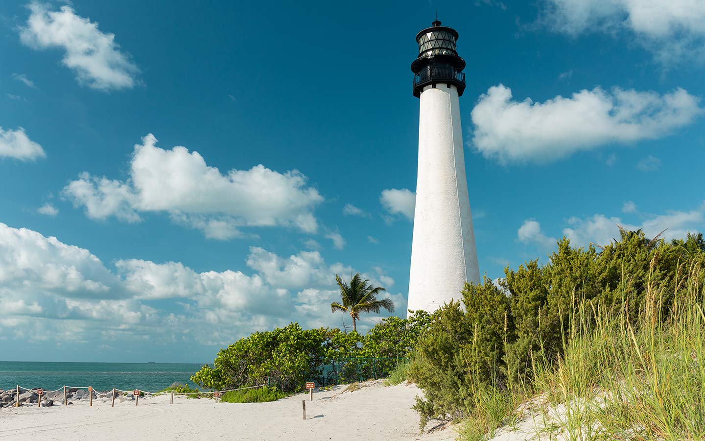 View of Bill Baggs Cape Florida Lighthouse from beach below