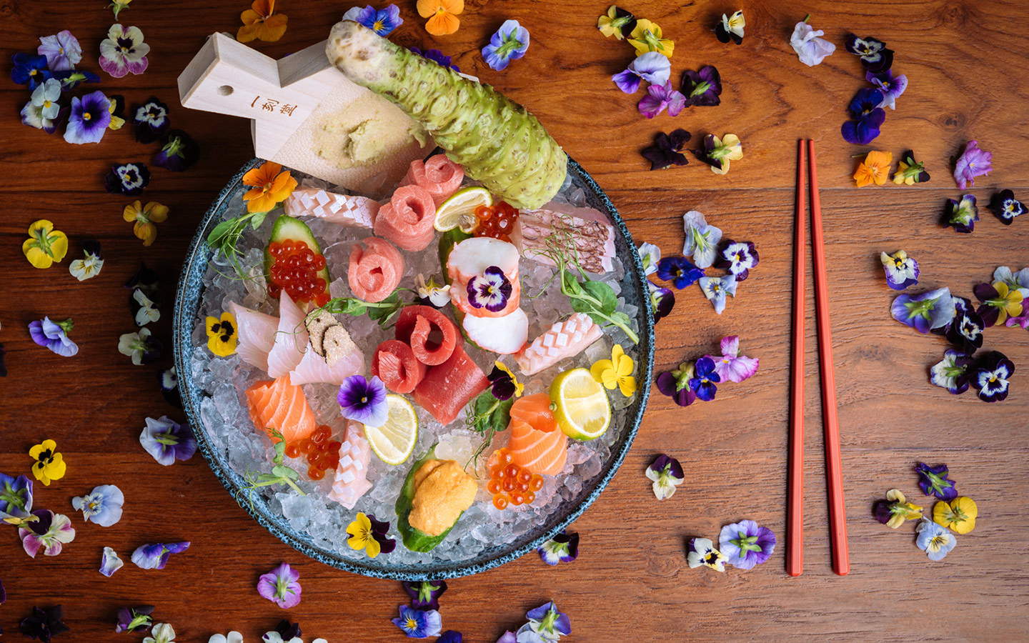Komodo's nigiri special, decorated with colorful pansies