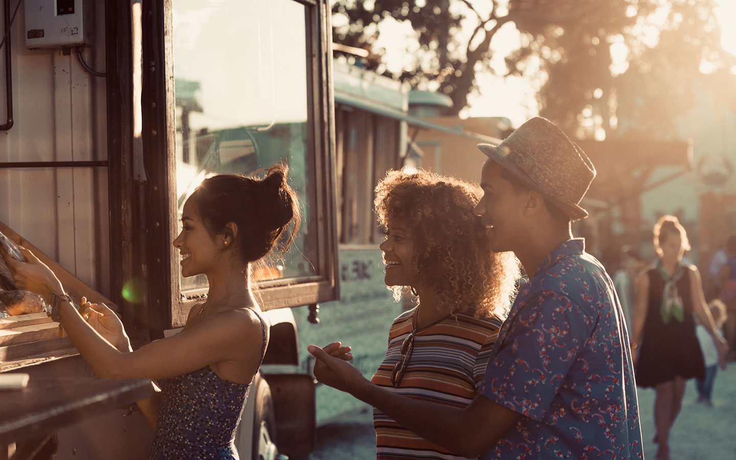Friends at food truck window in Wynwood Miami
